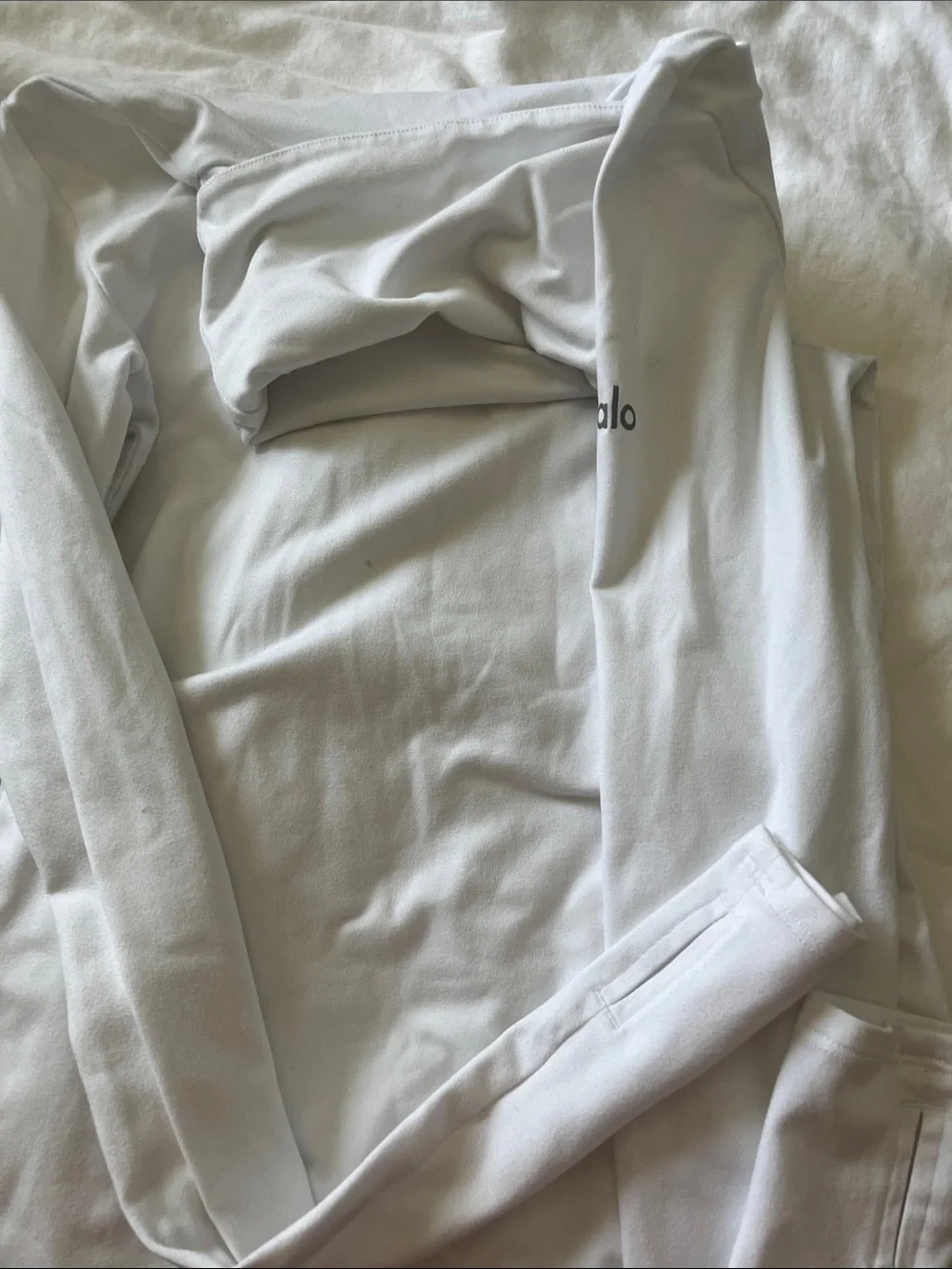 White full turtle neck top with thumb holes